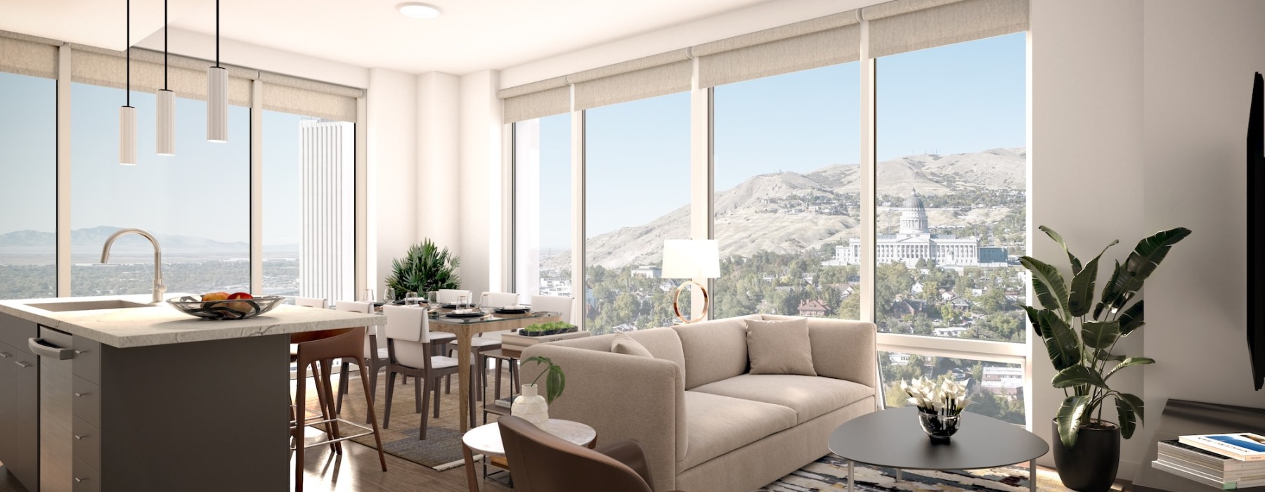 living room with a couch and large windows