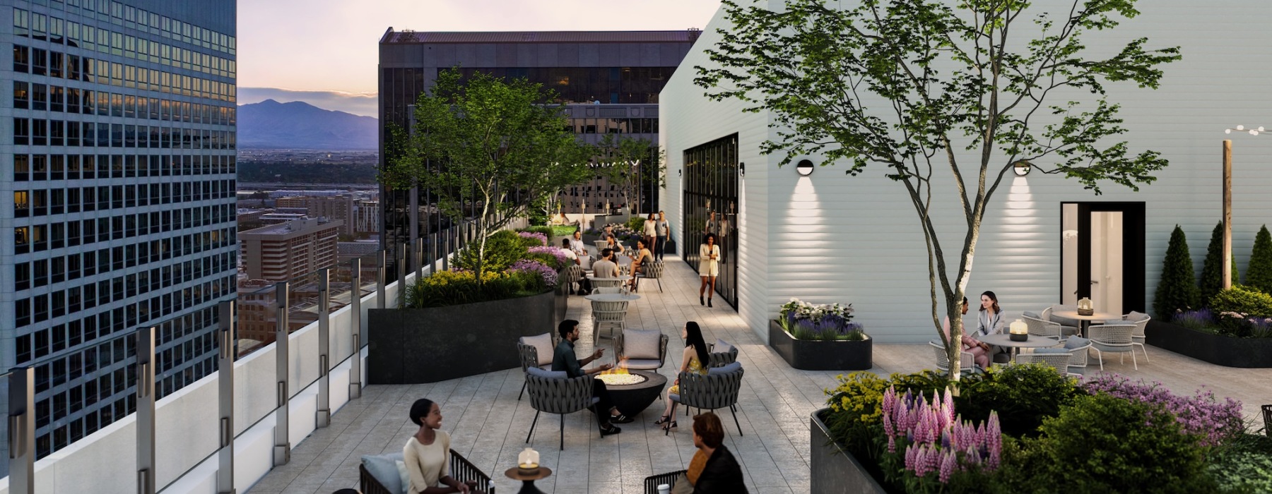 people hanging outside on a rooftop patio 