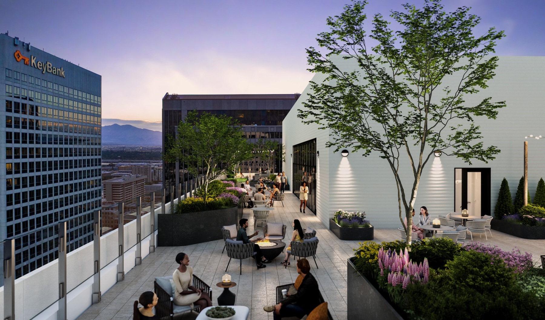 people hanging outside on a rooftop patio 